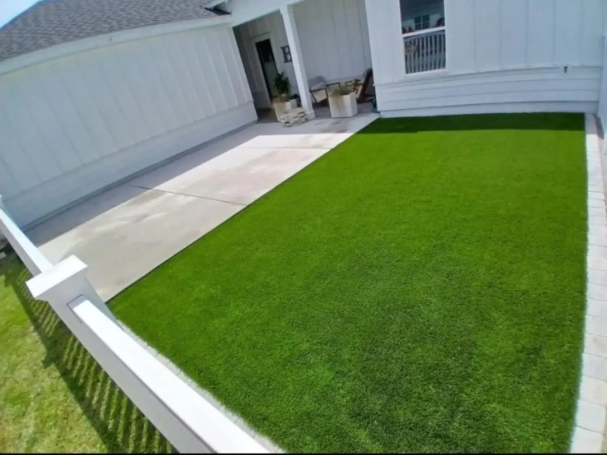 Patio next to artificial turf
